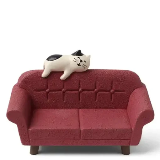 Figurine Cat On Red Sofa